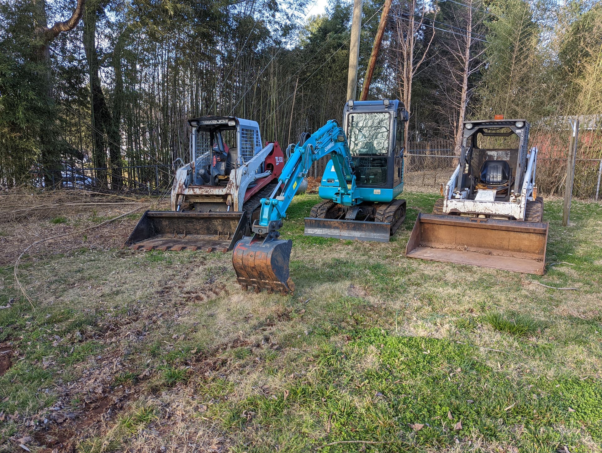 M&T Dirt Works equipment working a North Alabama job site